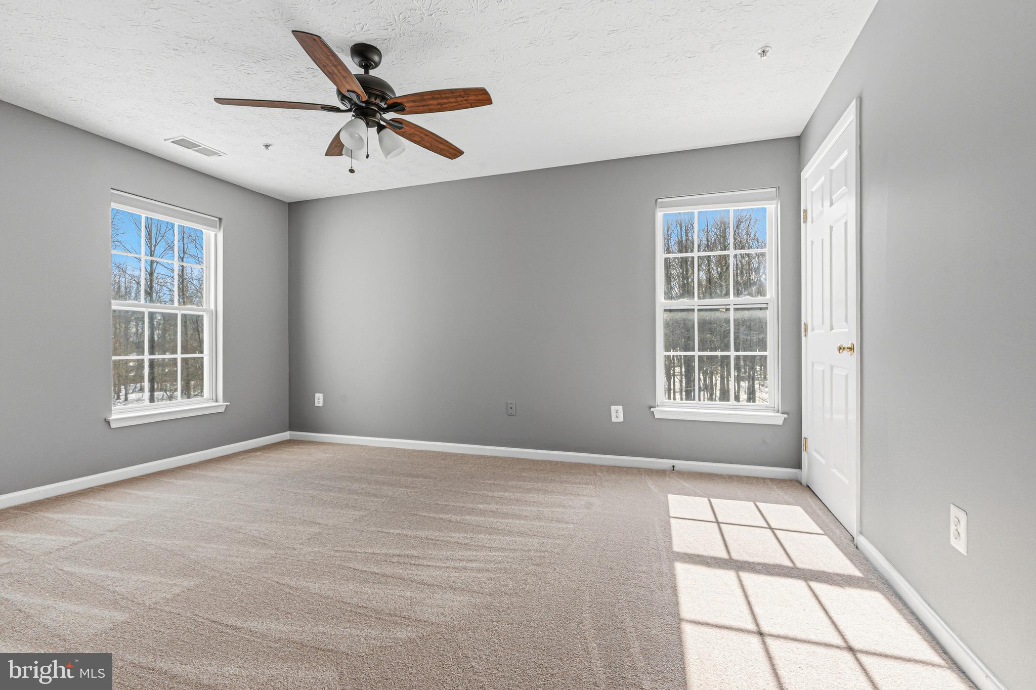 9 Brook Farm Court, Unit 9G Perry Hall, MD 21128 - Photo 22 of 33 a view of an empty room with a window