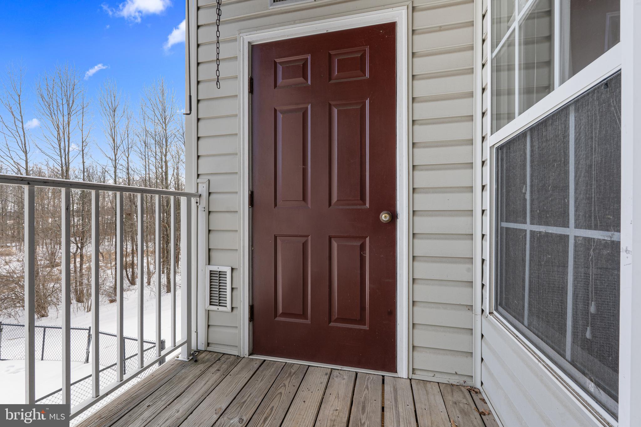 9 Brook Farm Court, Unit 9G Perry Hall, MD 21128 - Photo 29 of 33 a view of wooden balcony