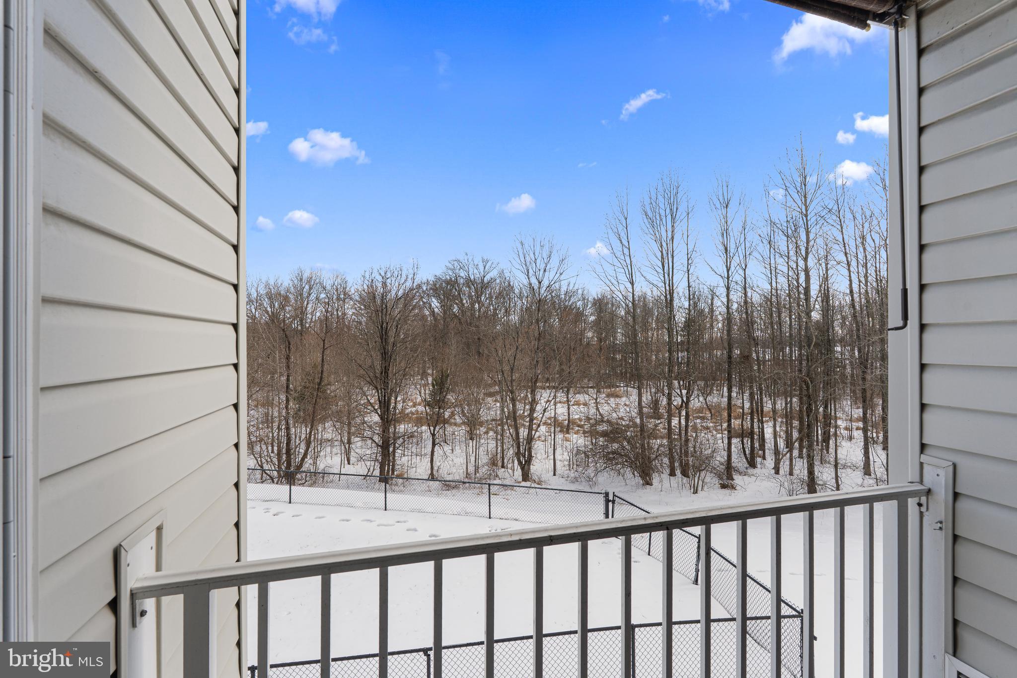 9 Brook Farm Court, Unit 9G Perry Hall, MD 21128 - Photo 30 of 33 a view of a balcony with trees