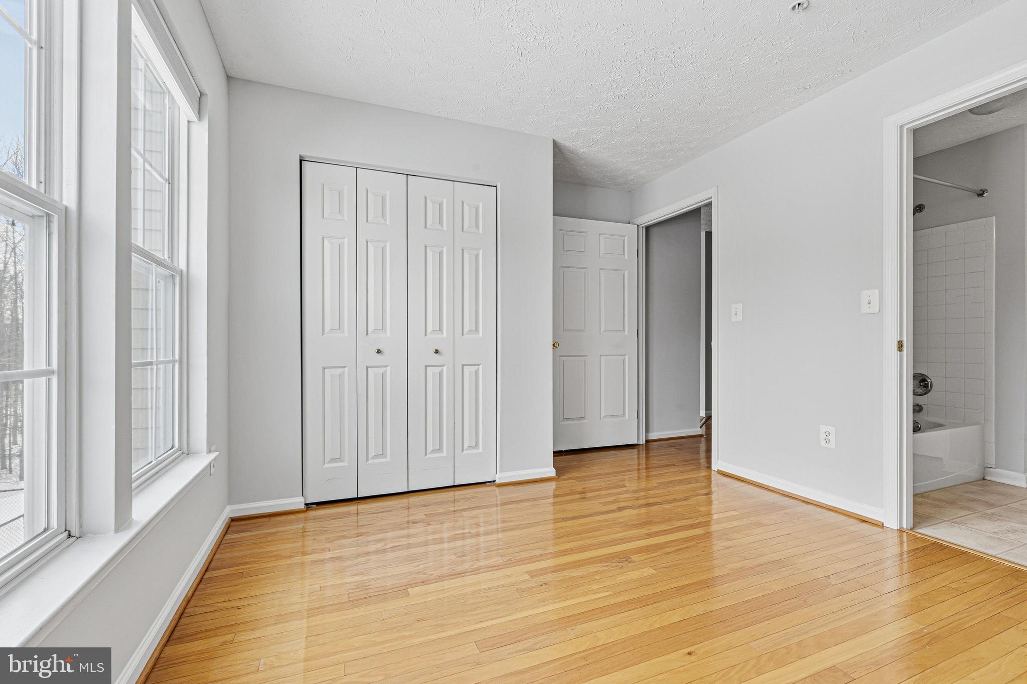9 Brook Farm Court, Unit 9G Perry Hall, MD 21128 - Photo 9 of 33 a view of empty room with wooden floor