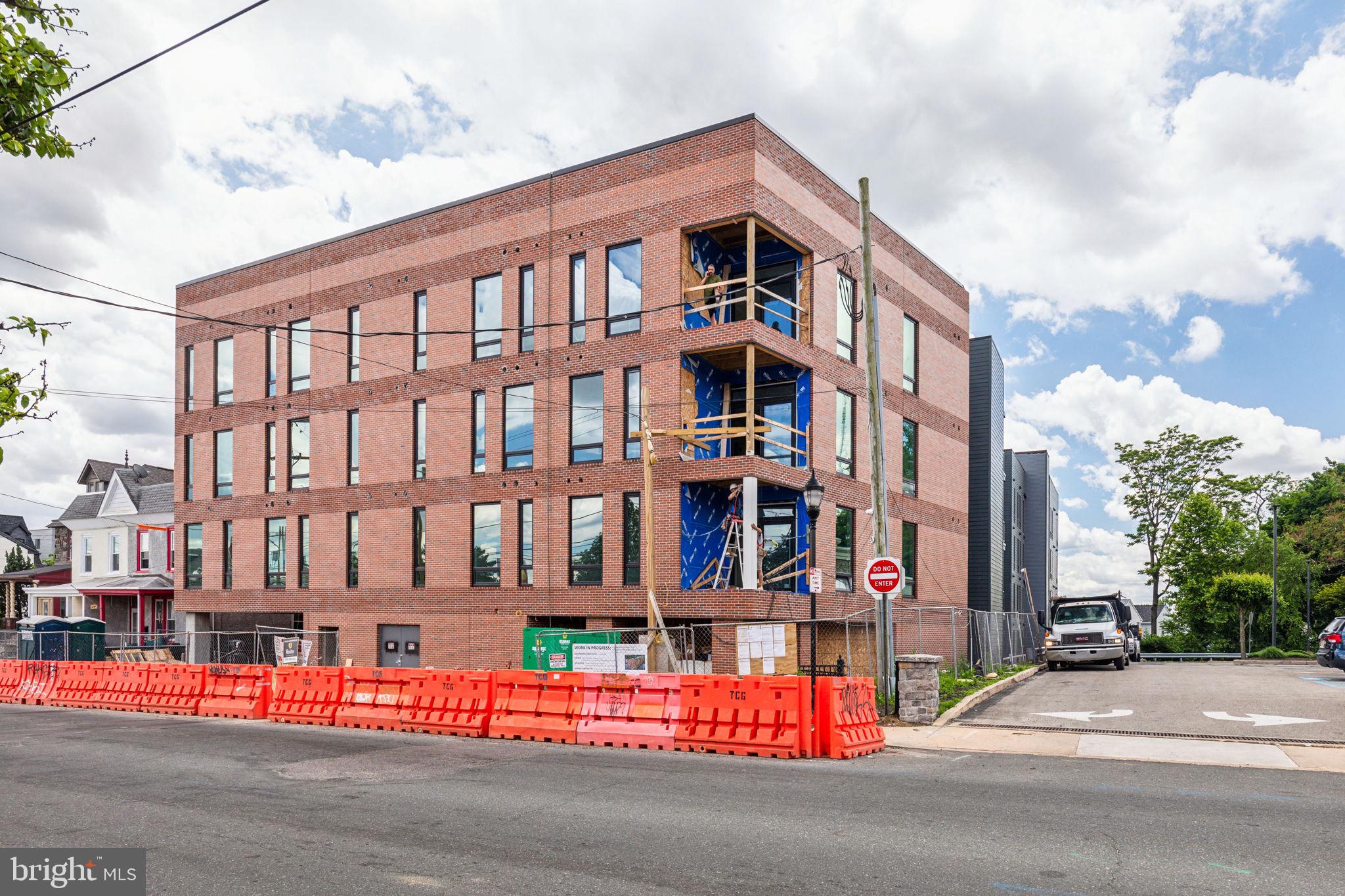 6910 Ridge Avenue, Unit 415 Philadelphia, PA 19128 - Photo 17 of 18 a view of a building with a street