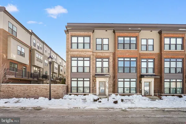 a front view of building with street