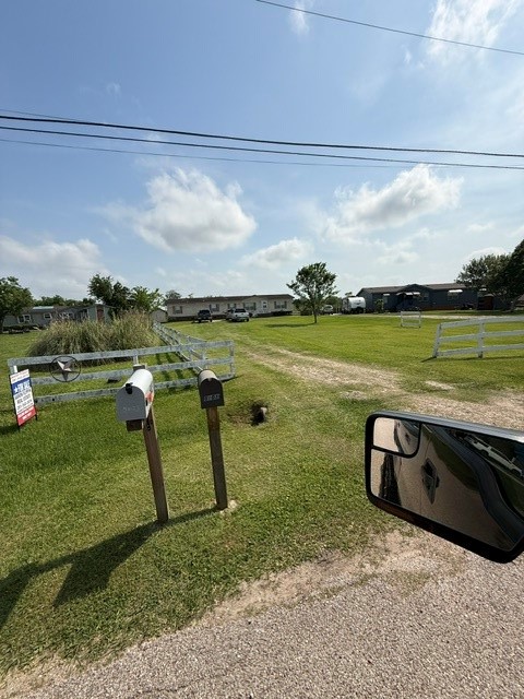 5023 Quail West Road Alvin, TX 77511 - Photo 8 of 22 Home for sale on left and house next door on right