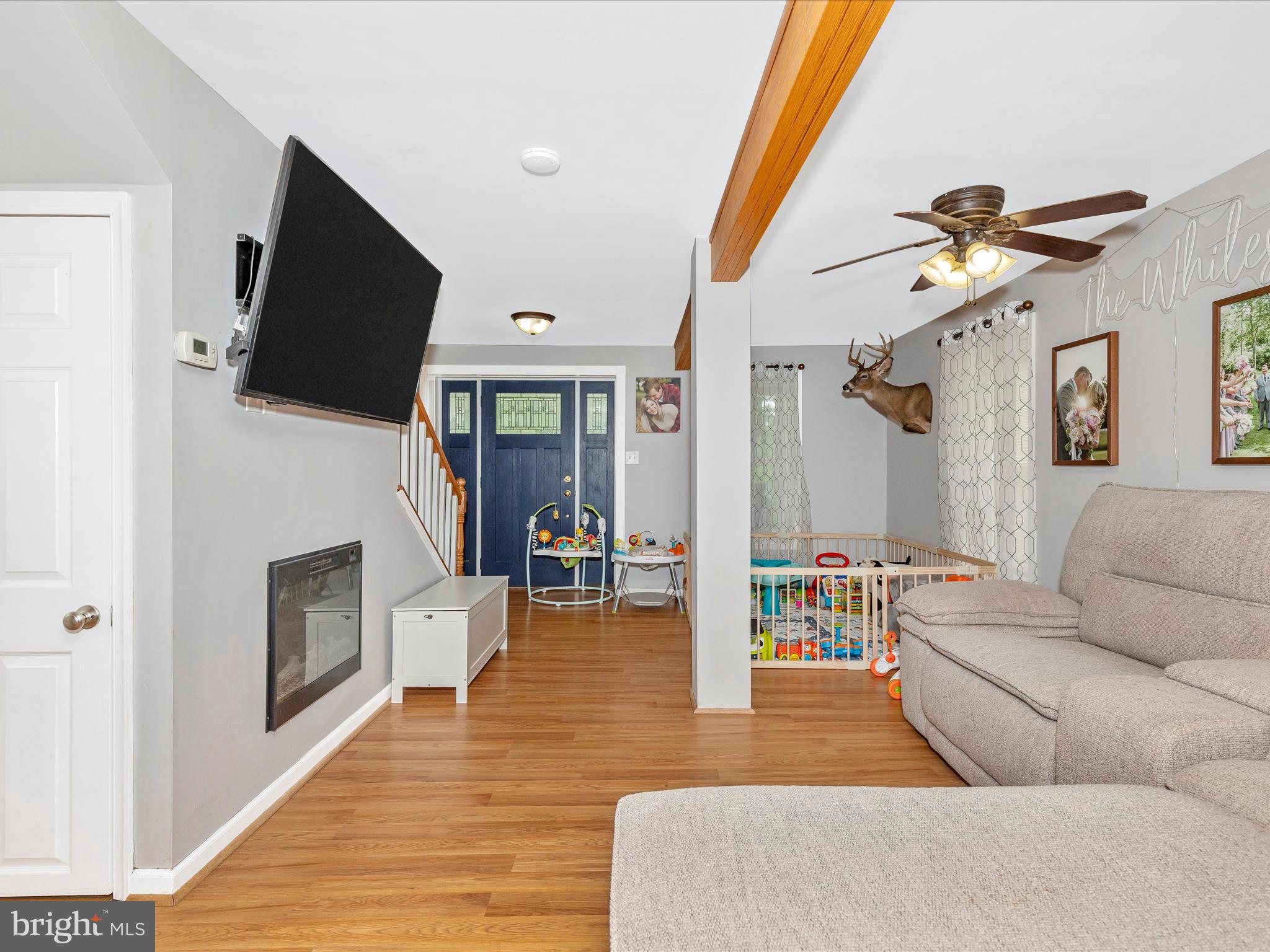 42 Bucher John Road Union Bridge, MD 21791 - Photo 14 of 48 a living room with furniture fireplace and flat screen tv
