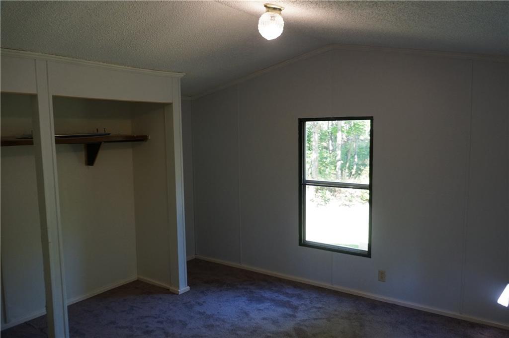 246 Troy Road Detroit, ME 04929 - Photo 25 of 35 Freshly painted bedroom with new carpet.