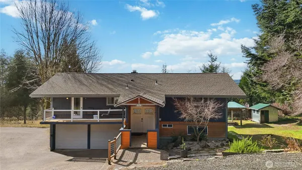 a view of house with outdoor seating space