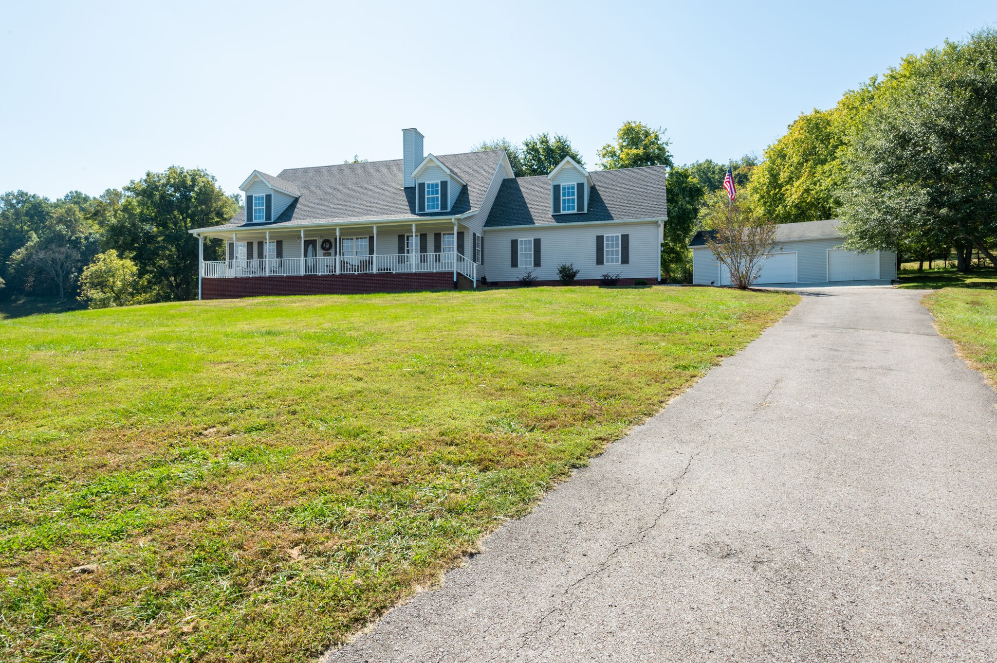 1549 Center Star Road Columbia, TN 38401 - Photo 2 of 50 a swimming pool with buildings in background