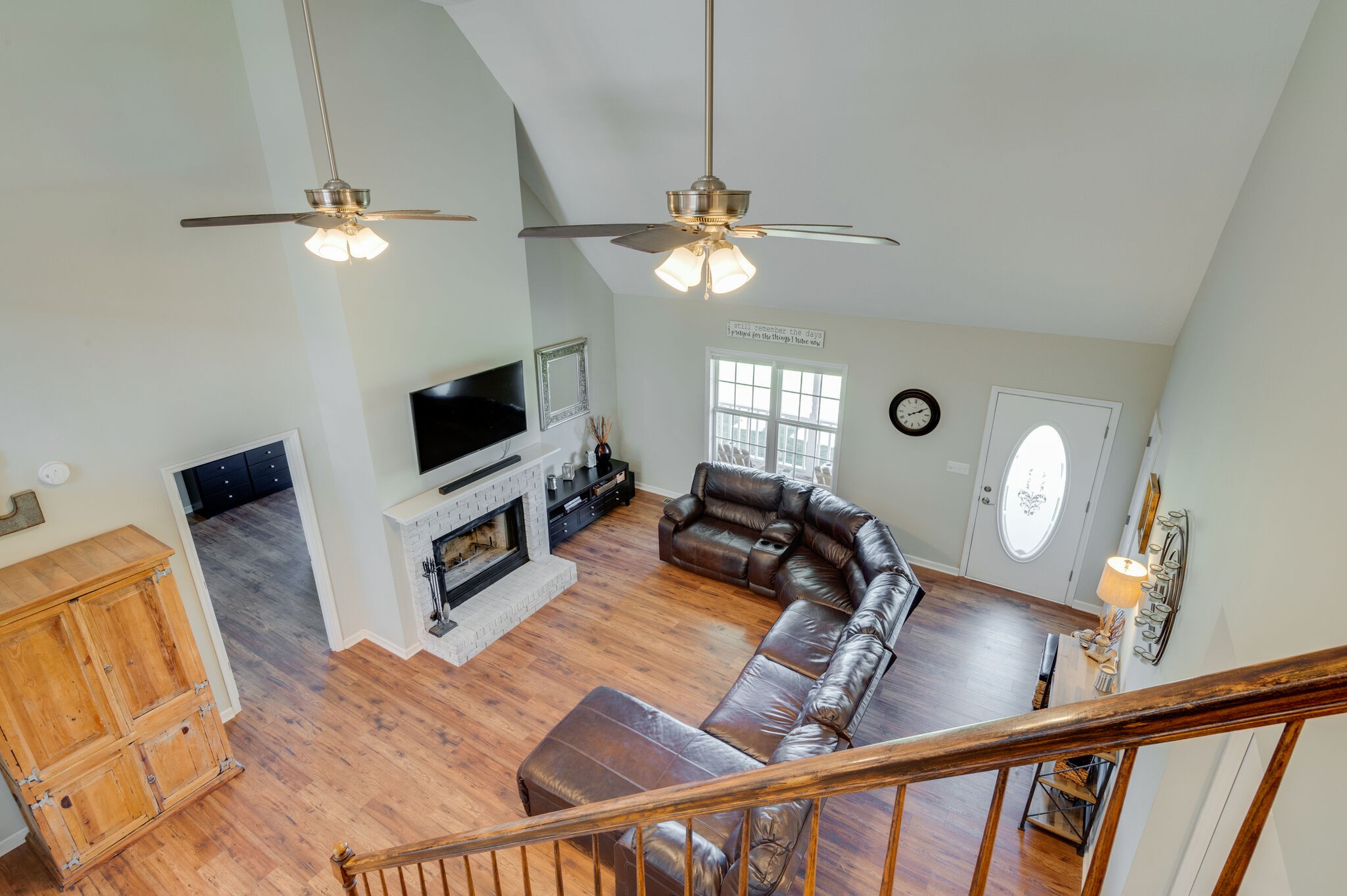 1549 Center Star Road Columbia, TN 38401 - Photo 17 of 50 a living room with furniture a chandelier and a flat screen tv