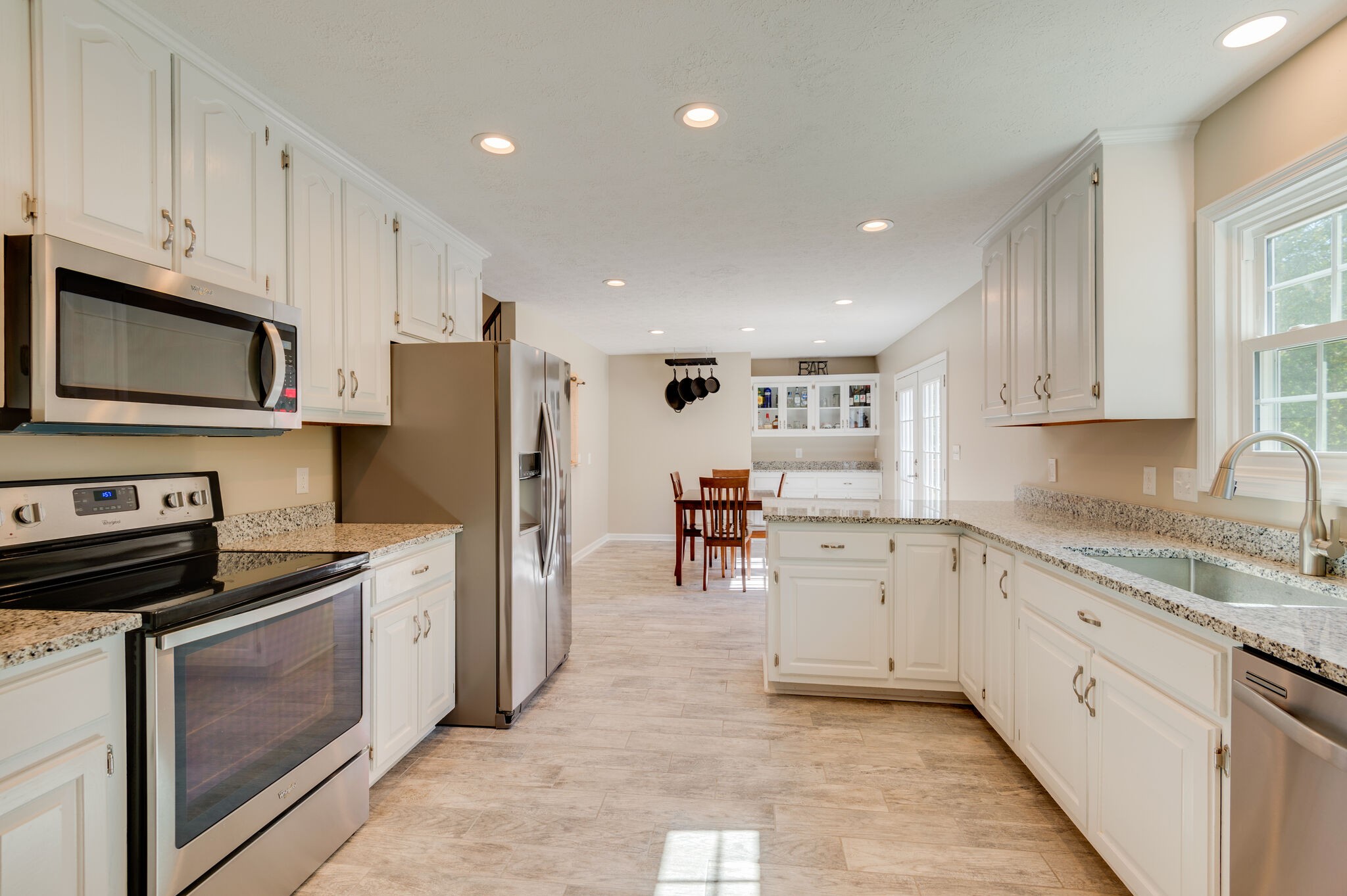 1549 Center Star Road Columbia, TN 38401 - Photo 21 of 50 a kitchen with a sink stainless steel appliances and cabinets