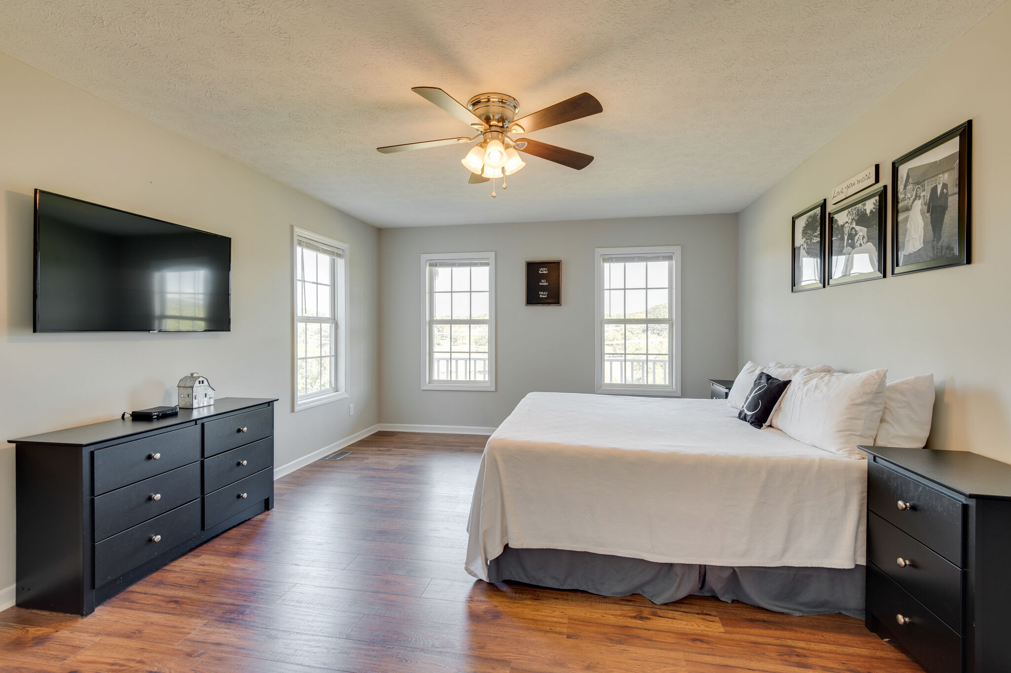 1549 Center Star Road Columbia, TN 38401 - Photo 22 of 50 a bedroom with a bed and a flat screen tv