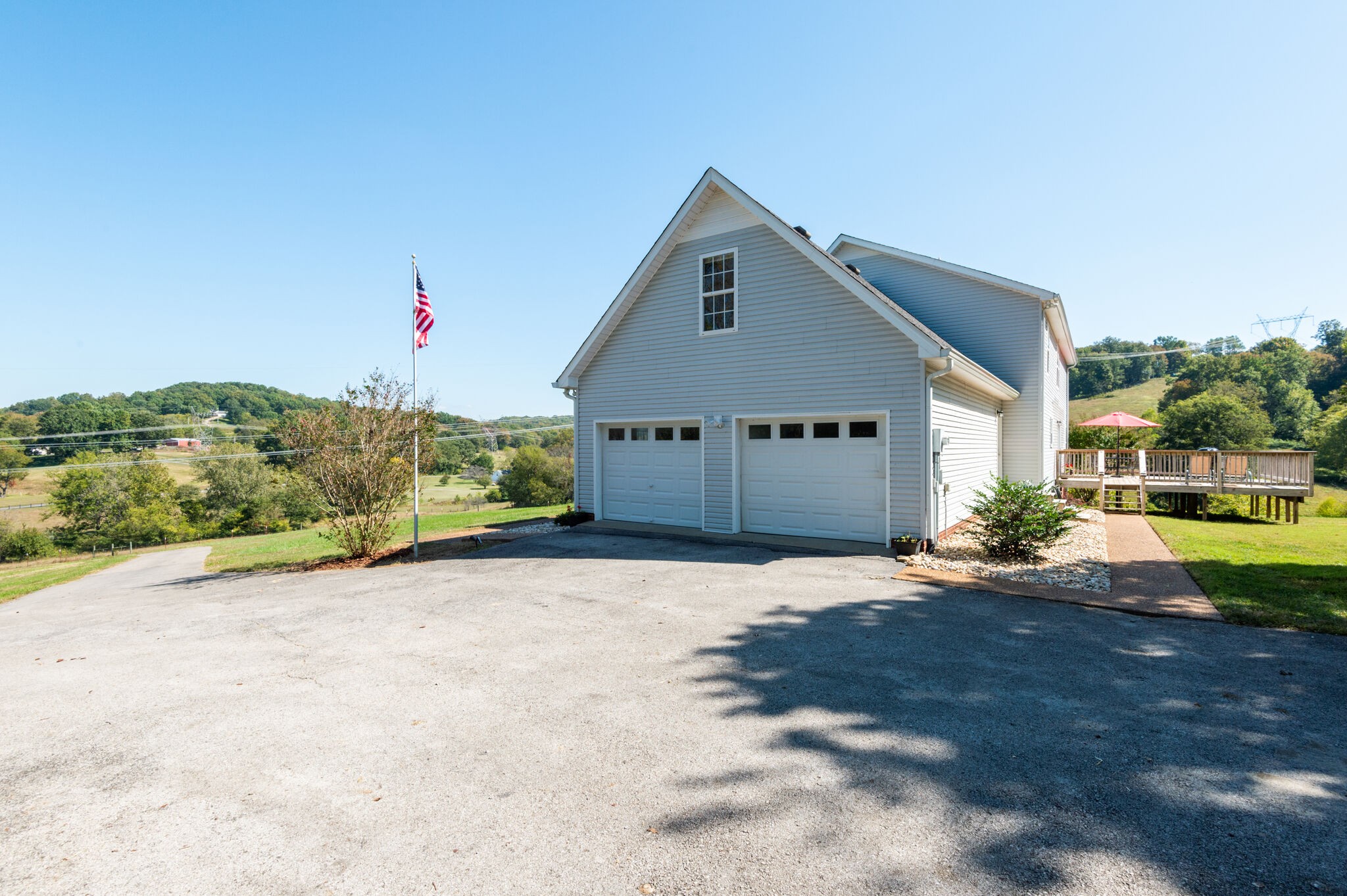 1549 Center Star Road Columbia, TN 38401 - Photo 4 of 50 a front view of a house with a yard and garage
