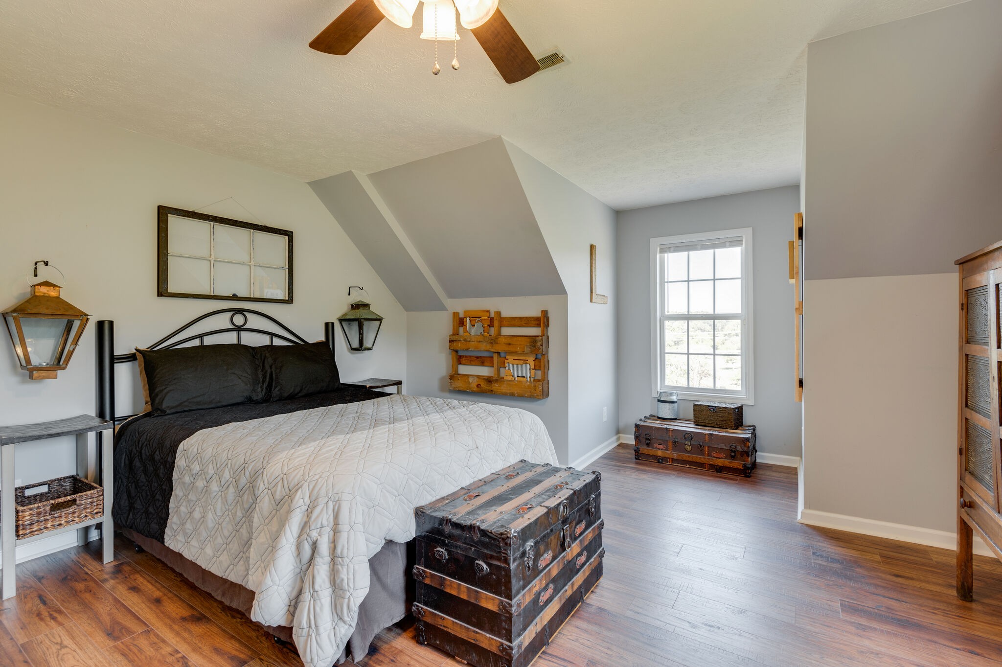 1549 Center Star Road Columbia, TN 38401 - Photo 32 of 50 a bedroom with a bed and wooden floor