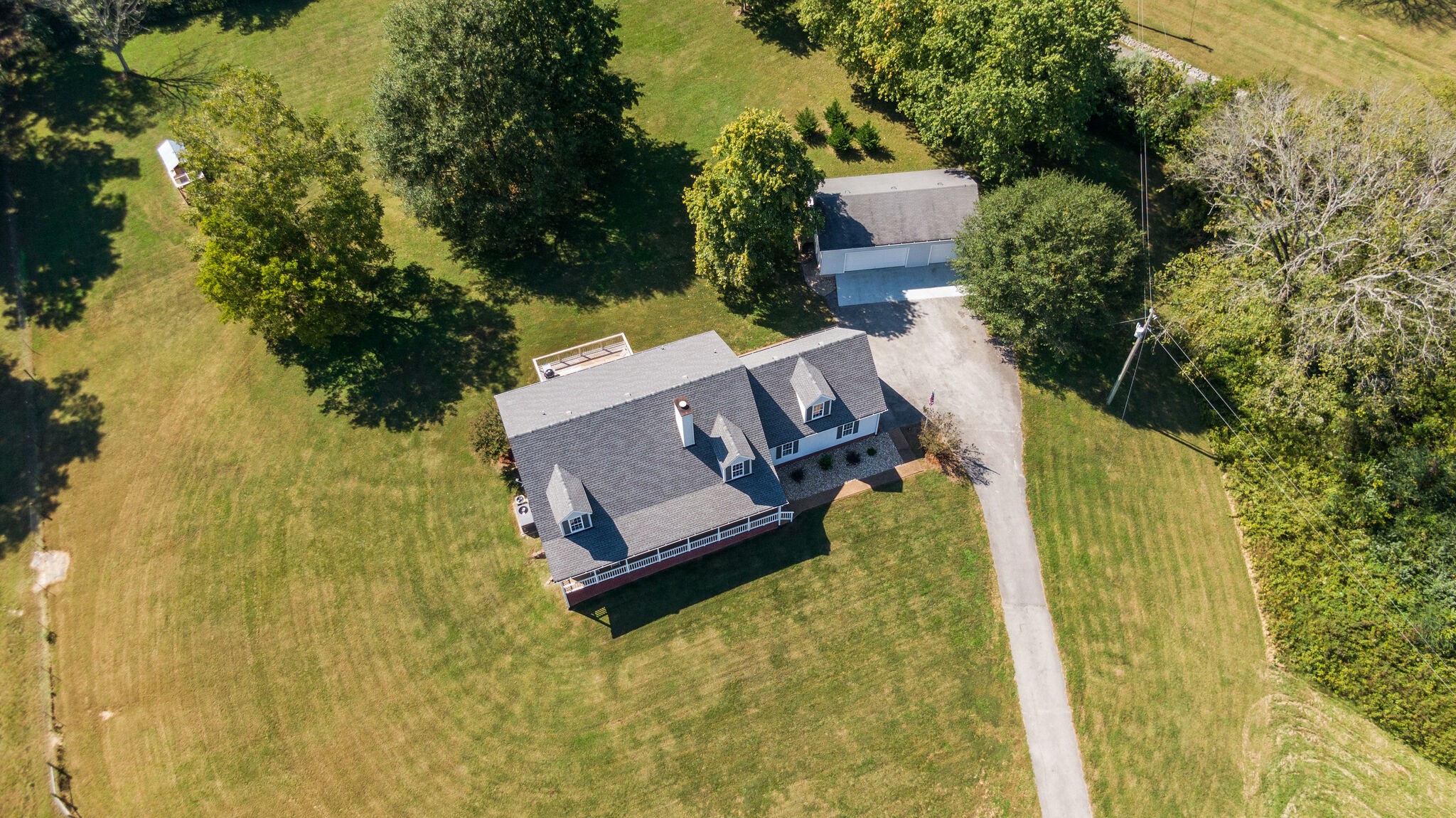 1549 Center Star Road Columbia, TN 38401 - Photo 48 of 50 an aerial view of a house with swimming pool