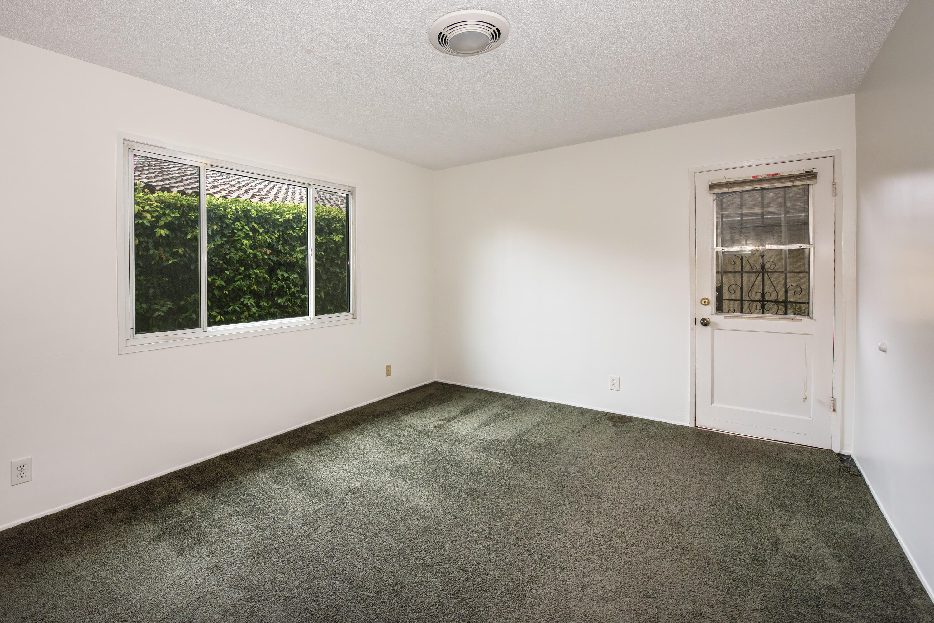 1308 Bath Street Santa Barbara, CA 93101 - Photo 14 of 19 an empty room with windows