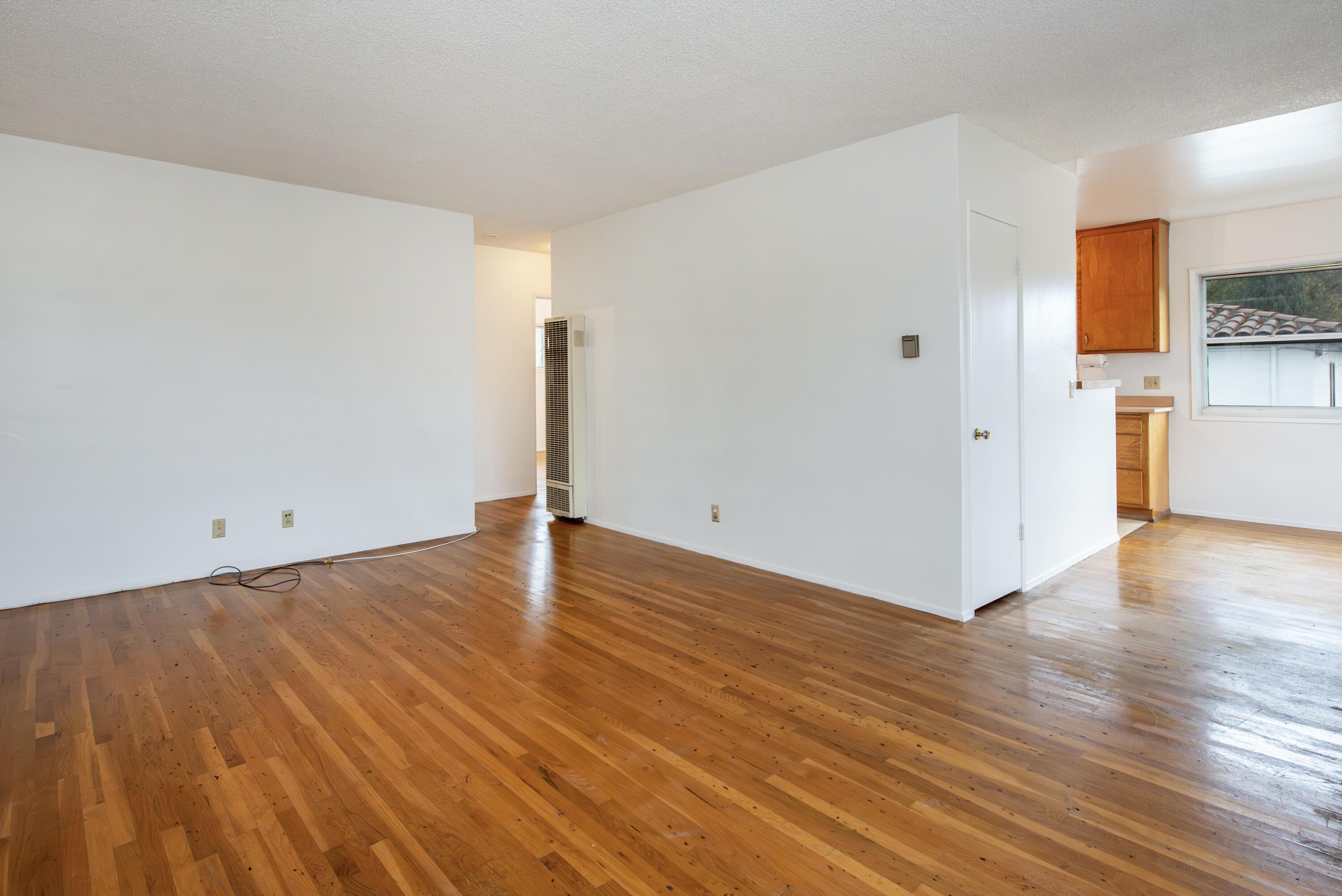 1308 Bath Street Santa Barbara, CA 93101 - Photo 5 of 19 a view of a room with wooden floor