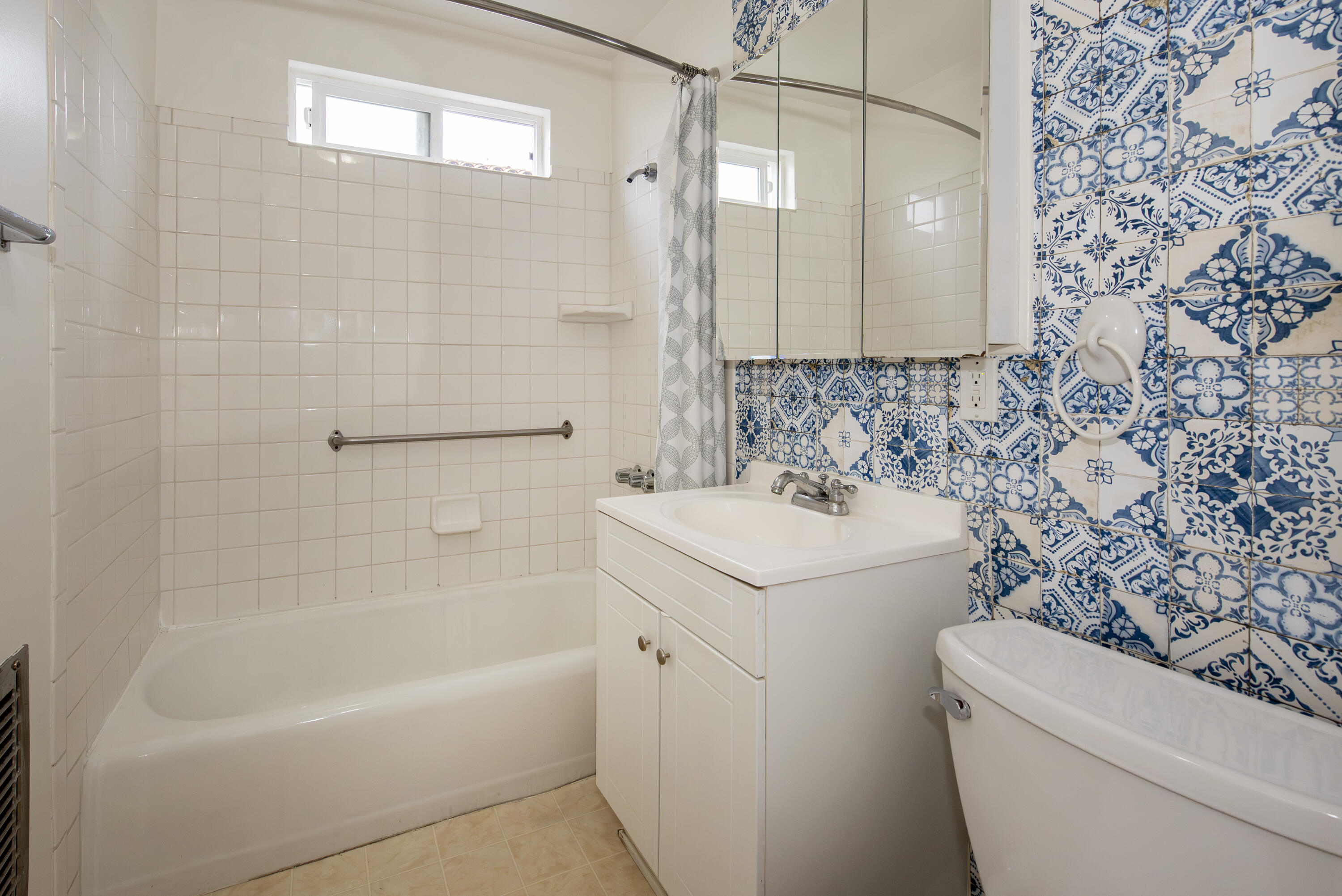 1308 Bath Street Santa Barbara, CA 93101 - Photo 9 of 19 a bathroom with a sink a toilet and shower