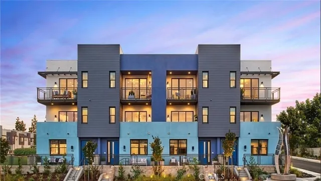 a front view of residential houses