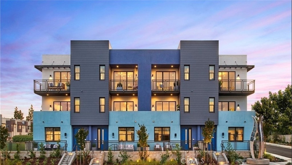 a front view of residential houses