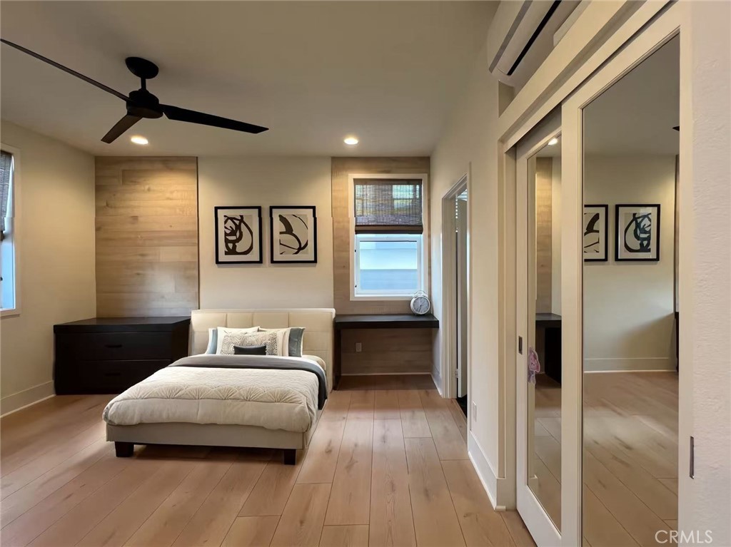 753 Site Drive Brea, CA 92821 - Photo 17 of 28 a spacious bedroom with a bed and a chandelier