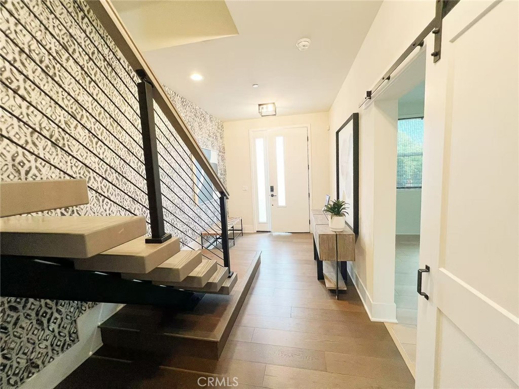 753 Site Drive Brea, CA 92821 - Photo 3 of 28 a view of a hallway with the couches and dinning table