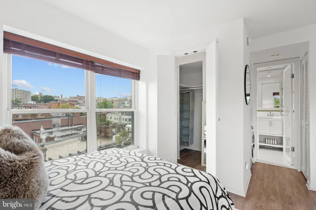 a bathroom with a walk in closet