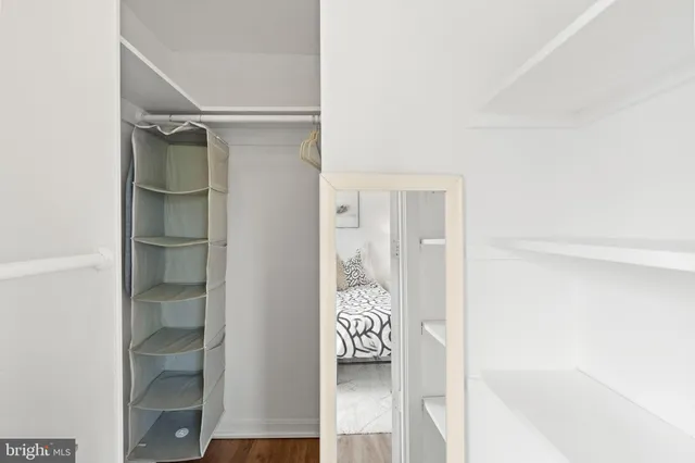 a view of a livingroom with washer and dryer