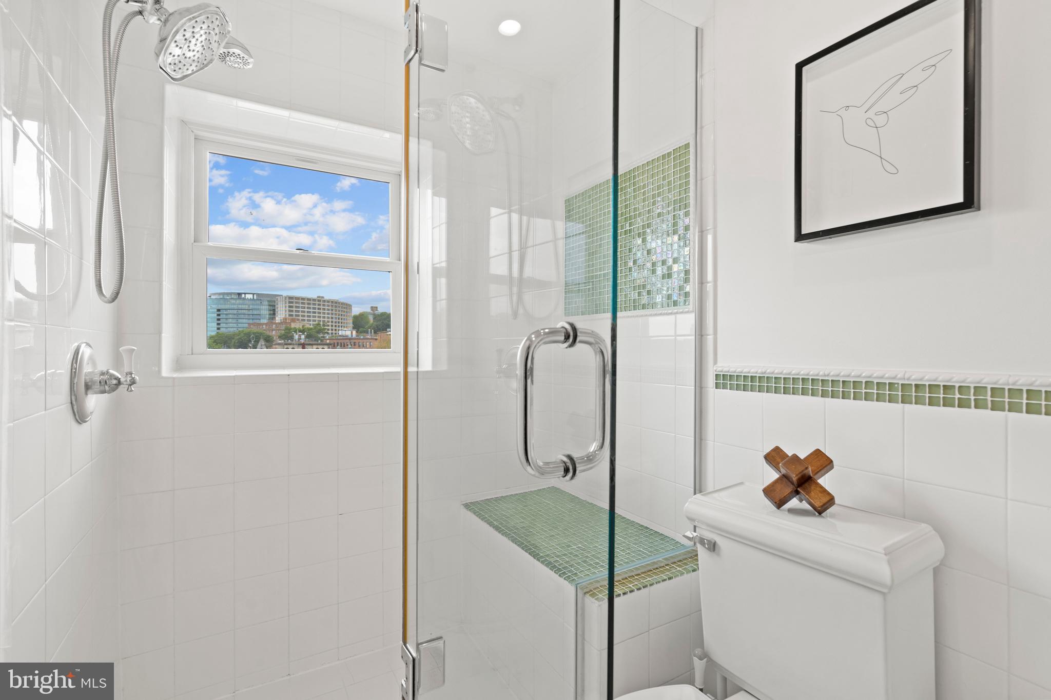 1736 Willard Street Northwest, Unit 506 Washington, DC 20009 - Photo 22 of 28 a bathroom with a shower and a sink