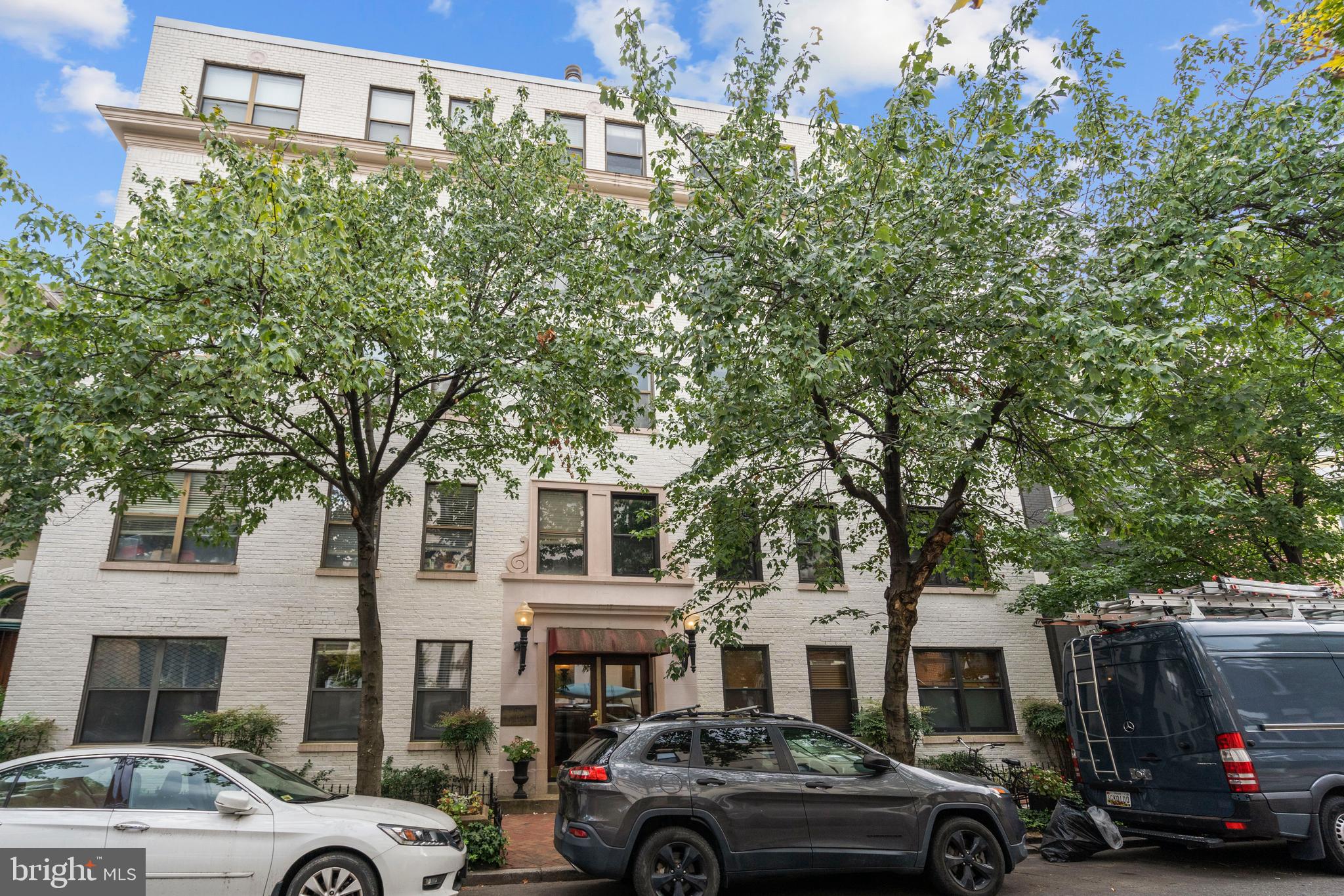 1736 Willard Street Northwest, Unit 506 Washington, DC 20009 - Photo 24 of 28 a view of a cars park in front of a building
