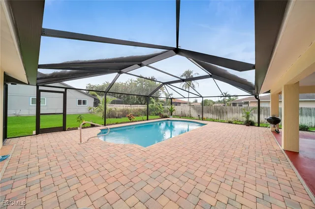 a view of a swimming pool with a porch