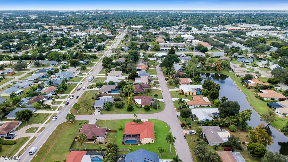 2191 Treehaven Circle Fort Myers, FL 33907 - Photo 28 of 31 an aerial view of residential houses with outdoor space and trees