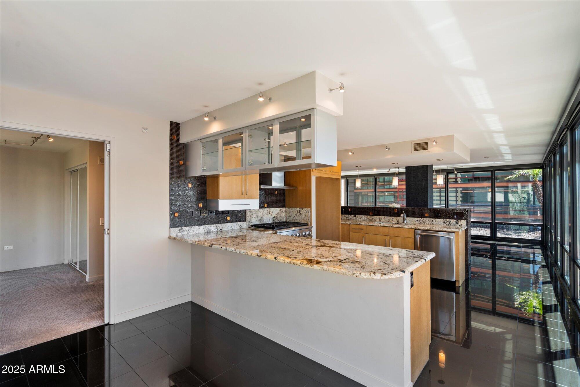 4808 North 24th Street, Unit 627 Phoenix, AZ 85016 - Photo 11 of 57 Kitchen & Guest Bedroom