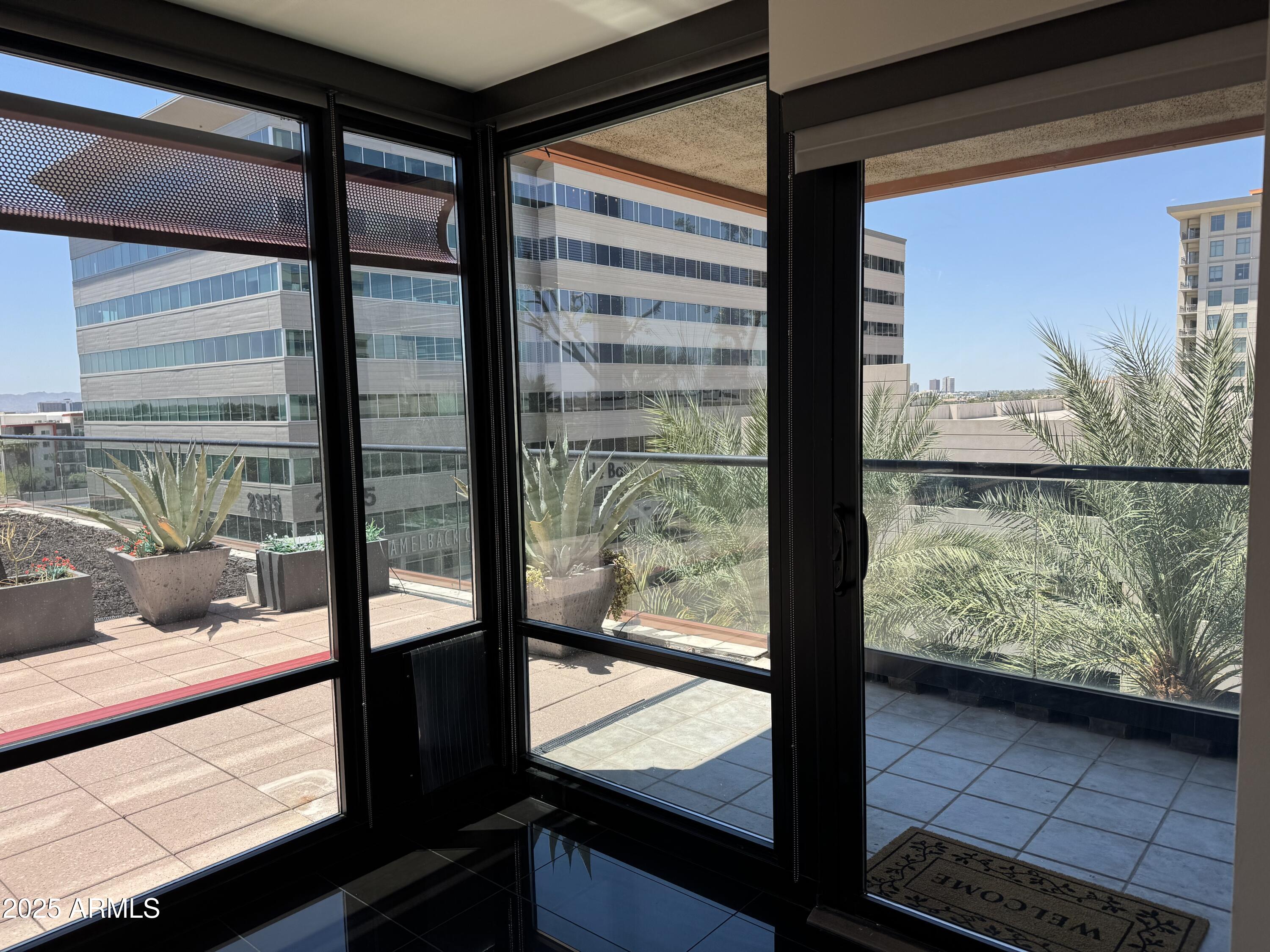 4808 North 24th Street, Unit 627 Phoenix, AZ 85016 - Photo 16 of 57 a view of window and living room