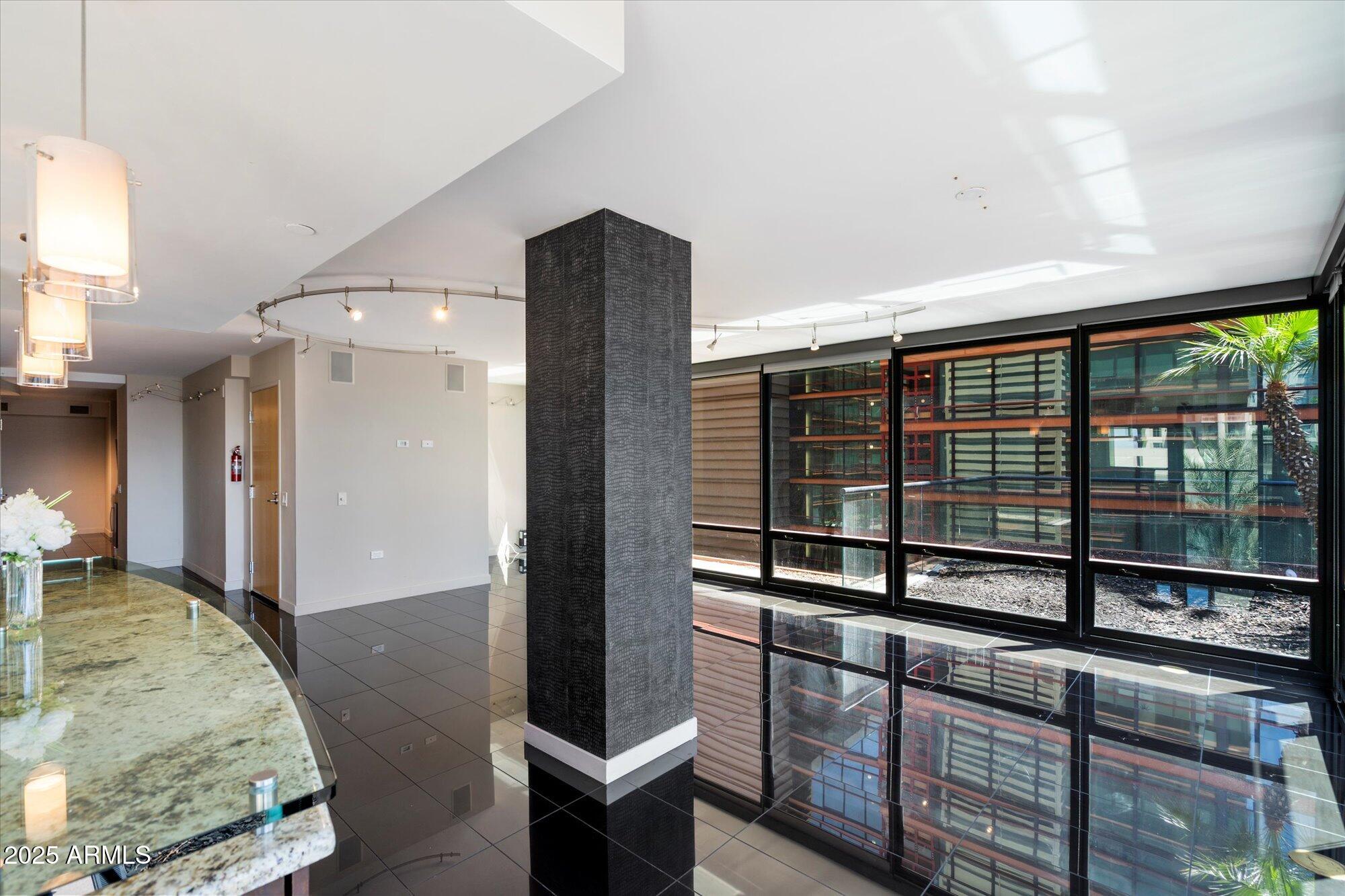 4808 North 24th Street, Unit 627 Phoenix, AZ 85016 - Photo 20 of 57 a view of a living room and a balcony