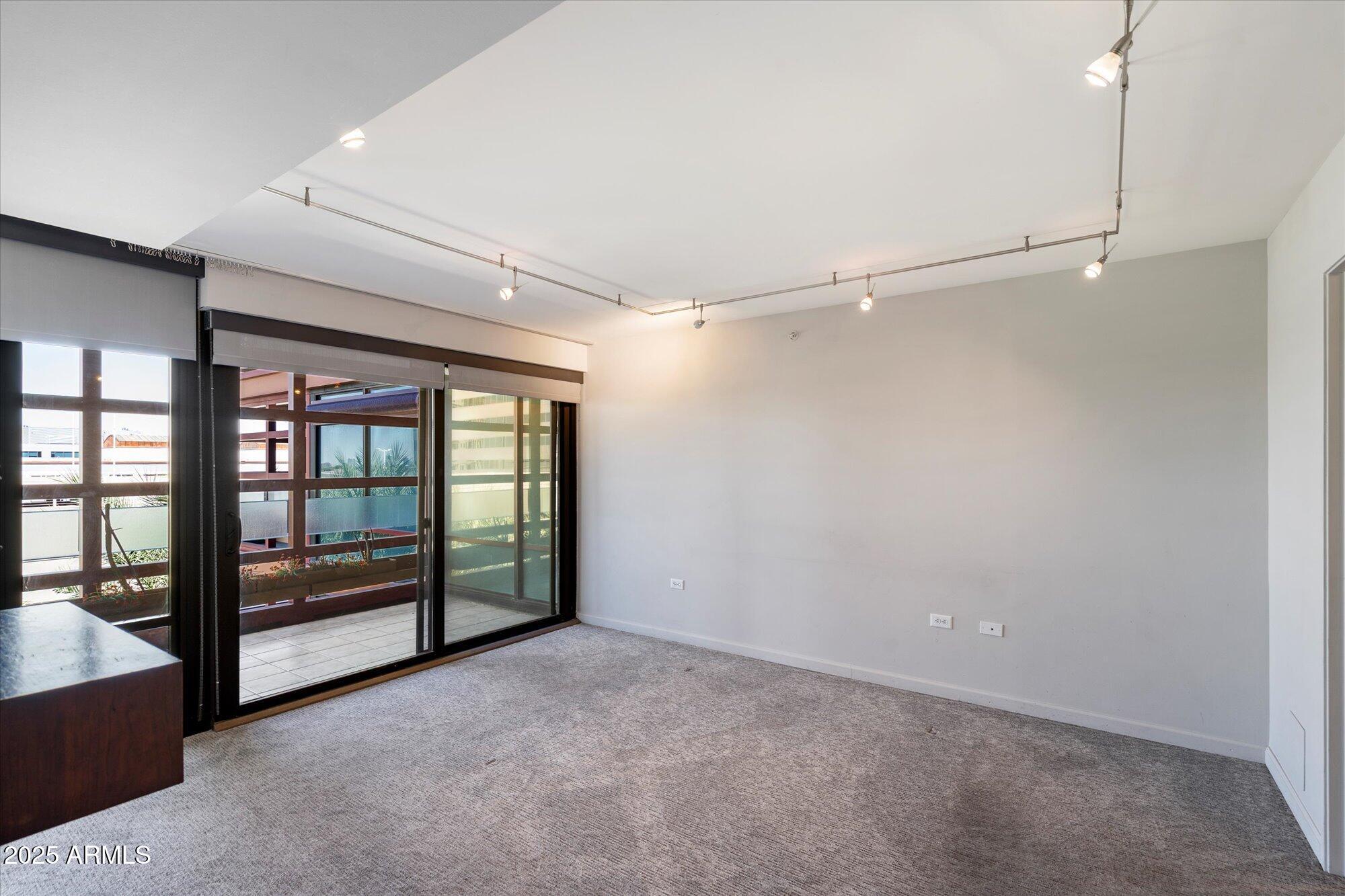 4808 North 24th Street, Unit 627 Phoenix, AZ 85016 - Photo 22 of 57 Primary Bedroom & Private Balcony