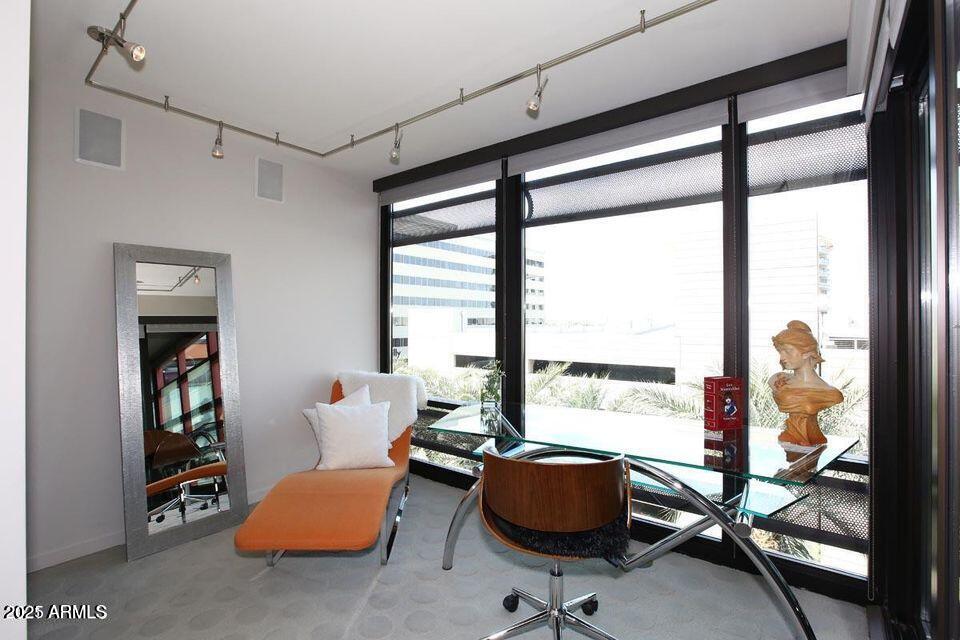 4808 North 24th Street, Unit 627 Phoenix, AZ 85016 - Photo 28 of 57 a room with furniture and a window