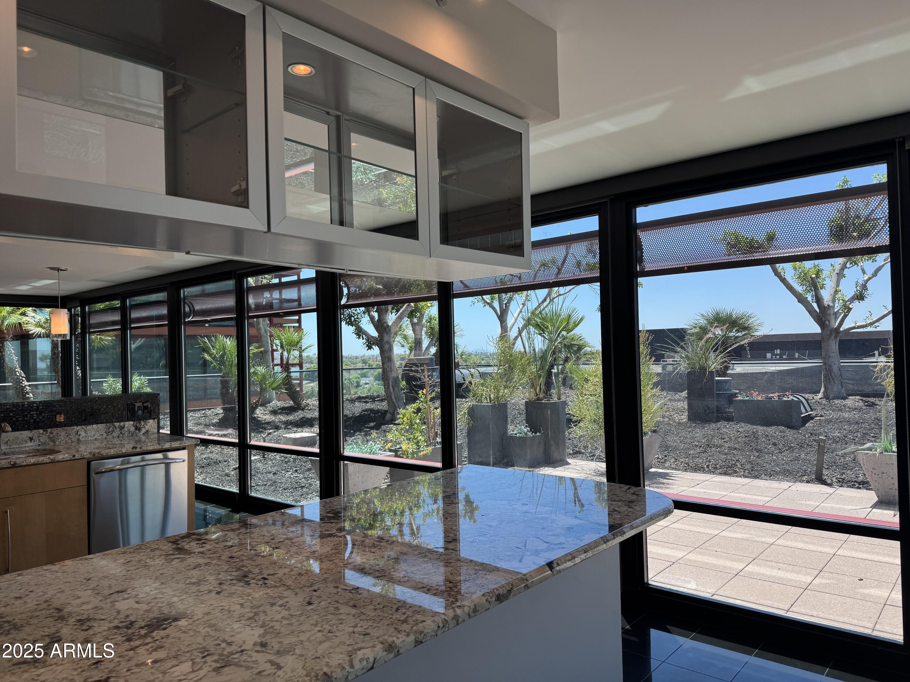4808 North 24th Street, Unit 627 Phoenix, AZ 85016 - Photo 4 of 57 a view of a large window with an outdoor view