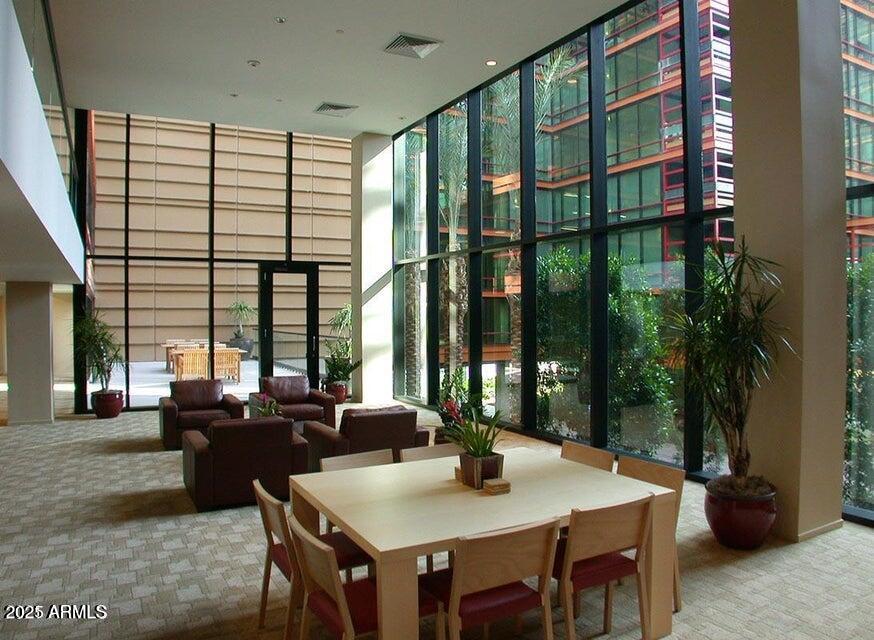 4808 North 24th Street, Unit 627 Phoenix, AZ 85016 - Photo 42 of 57 a view of a dining room with furniture window and outside view