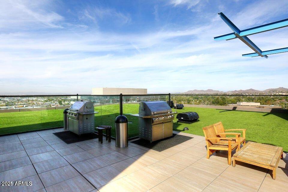 4808 North 24th Street, Unit 627 Phoenix, AZ 85016 - Photo 47 of 57 a terrace with outdoor seating