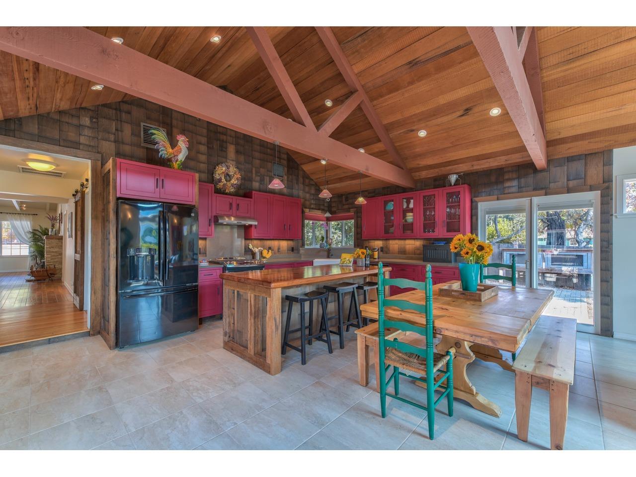 308 West Carmel Valley Road Carmel Valley, CA 93924 - Photo 13 of 49 a room with stainless steel appliances lots of wooden furniture