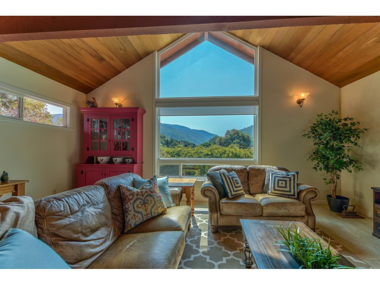 308 West Carmel Valley Road Carmel Valley, CA 93924 - Photo 17 of 49 a living room with furniture and a couch