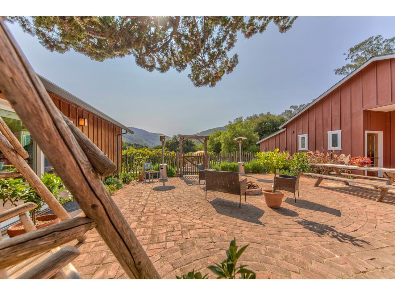 308 West Carmel Valley Road Carmel Valley, CA 93924 - Photo 34 of 49 a view of a backyard with sitting area