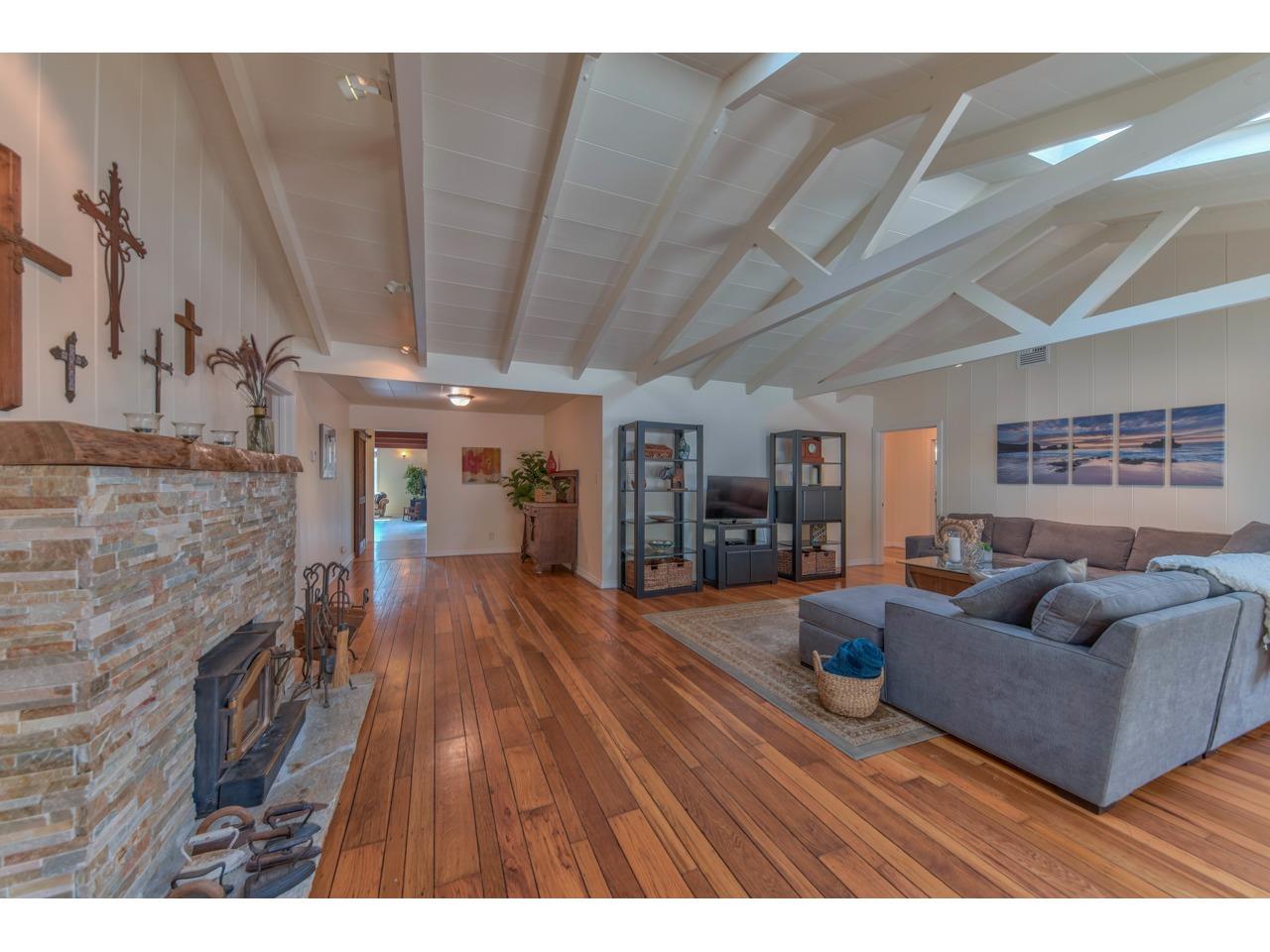 308 West Carmel Valley Road Carmel Valley, CA 93924 - Photo 9 of 49 a living room with furniture and wooden floor