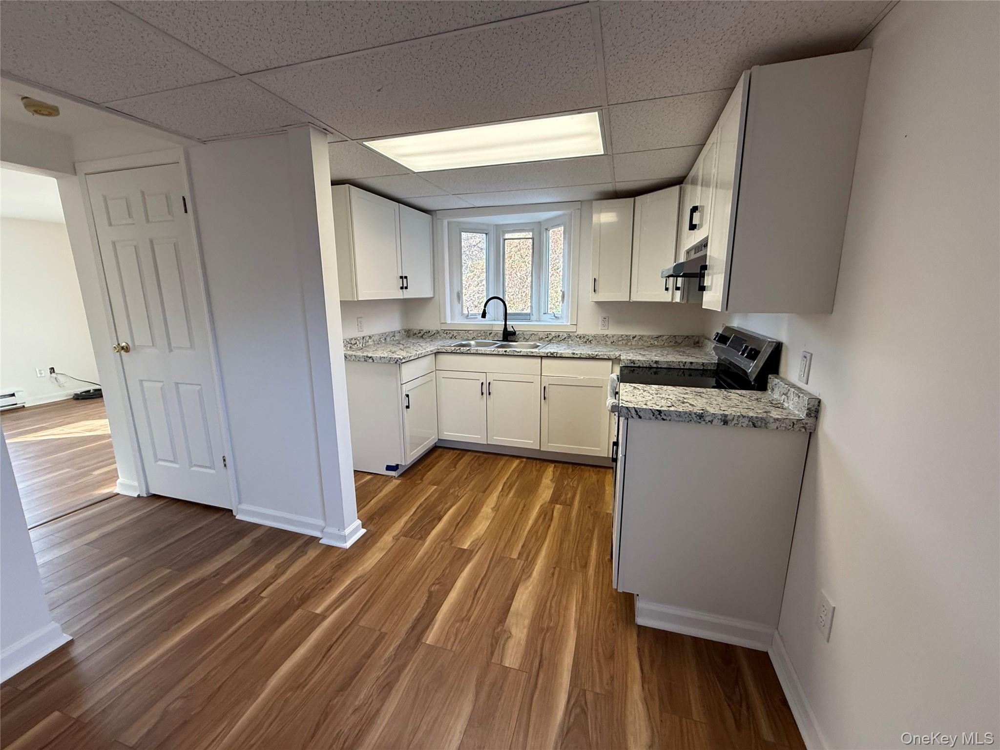 81 Gerald Drive Poughkeepsie, NY 12601 - Photo 7 of 20 a kitchen with sink and cabinets