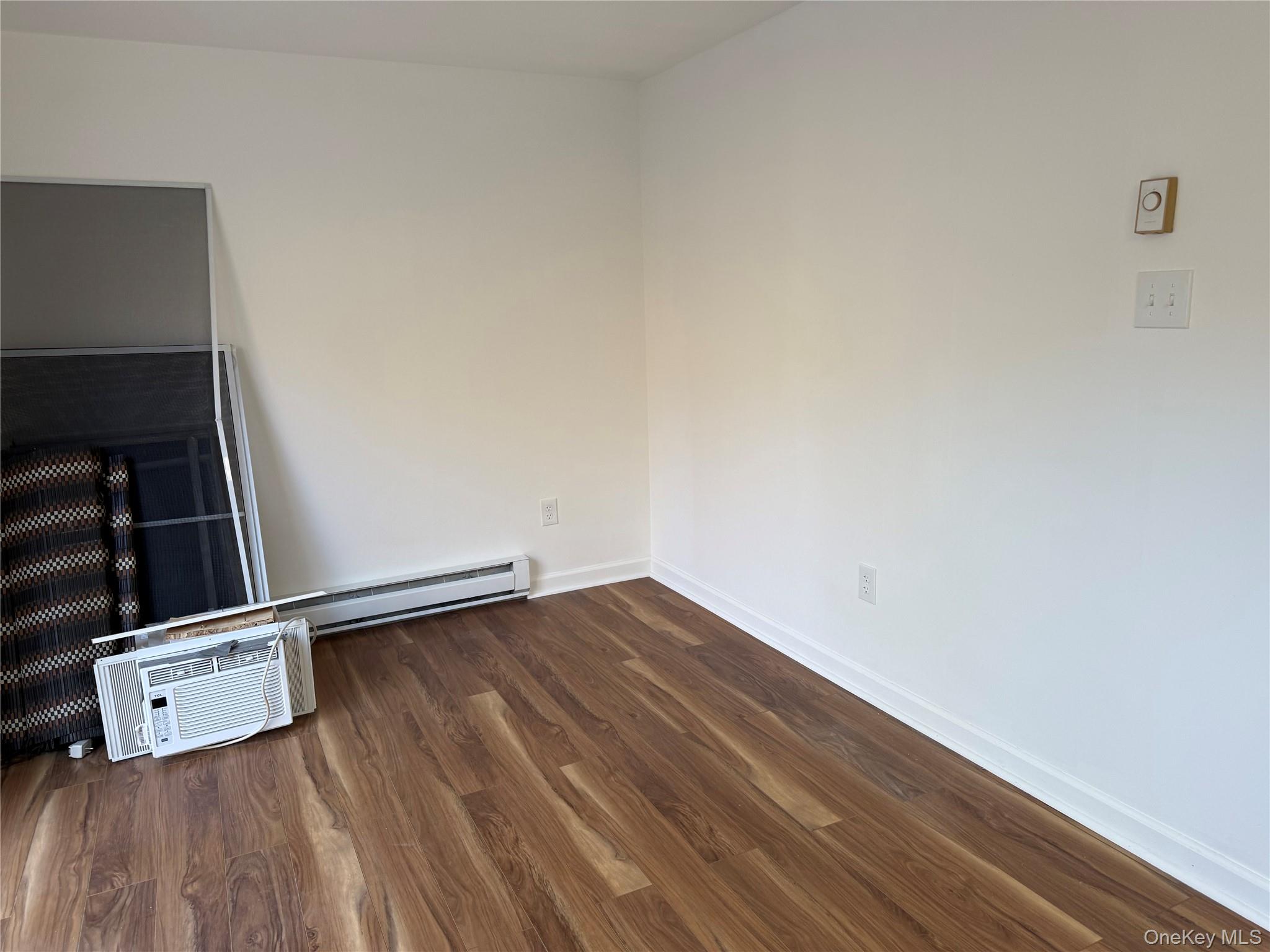 81 Gerald Drive Poughkeepsie, NY 12601 - Photo 8 of 20 a view of a room with wooden floor