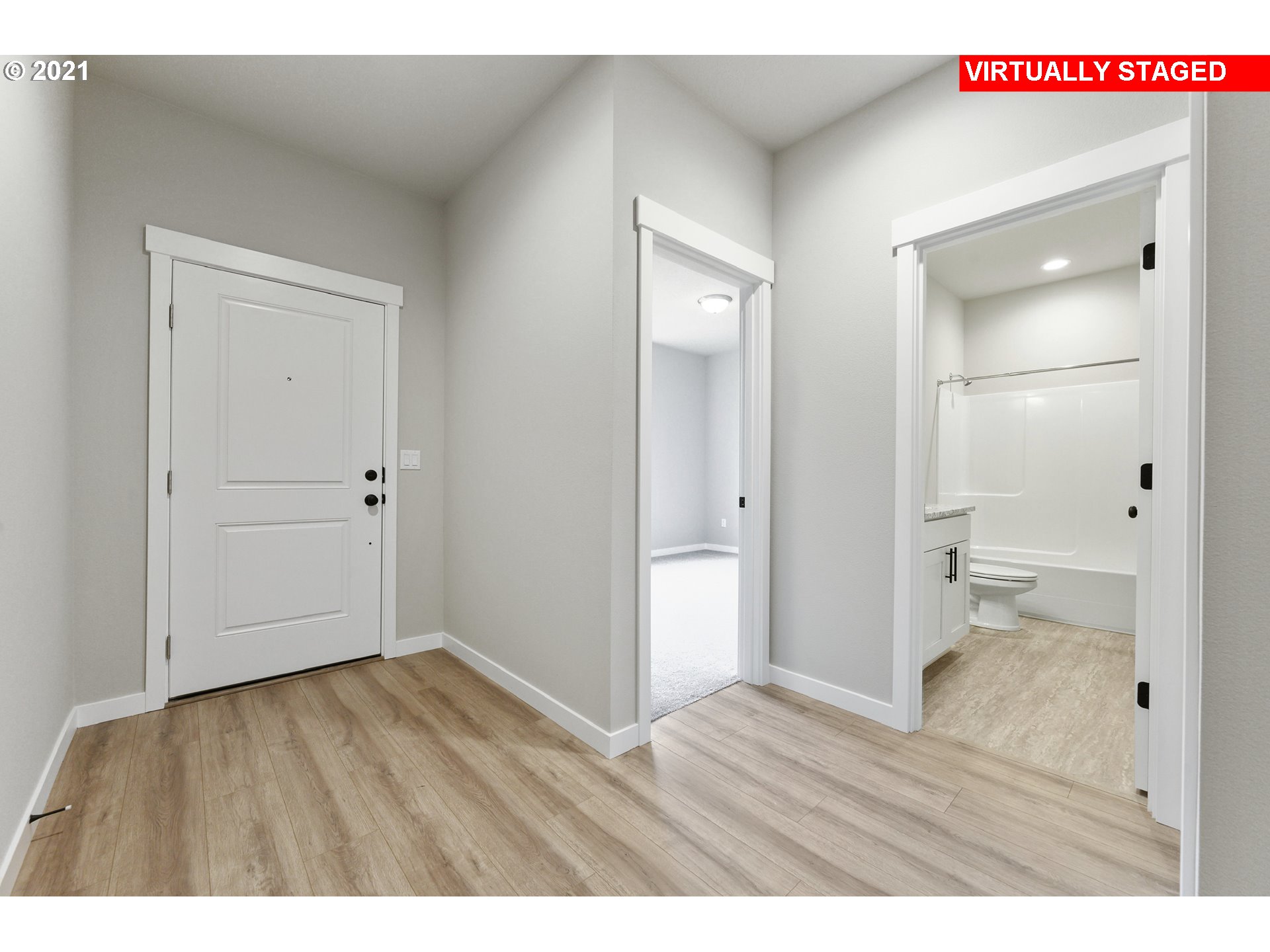 8528 North 5th Street, Unit LT31 Ridgefield, WA 98642 - Photo 22 of 31 a view of an empty room with wooden floor