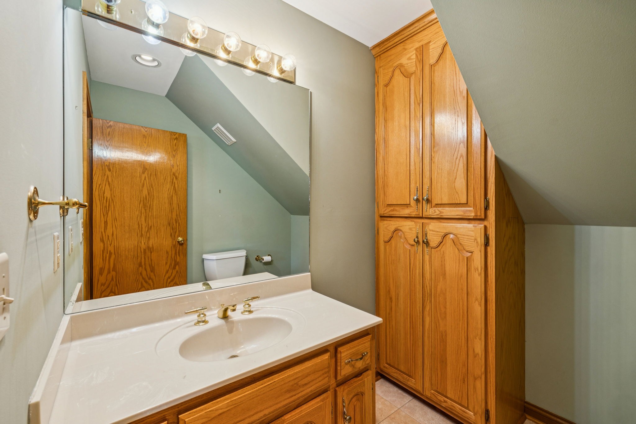 7935 Old Springfield Pike Goodlettsville, TN 37072 - Photo 20 of 82 a bathroom with a sink and a mirror