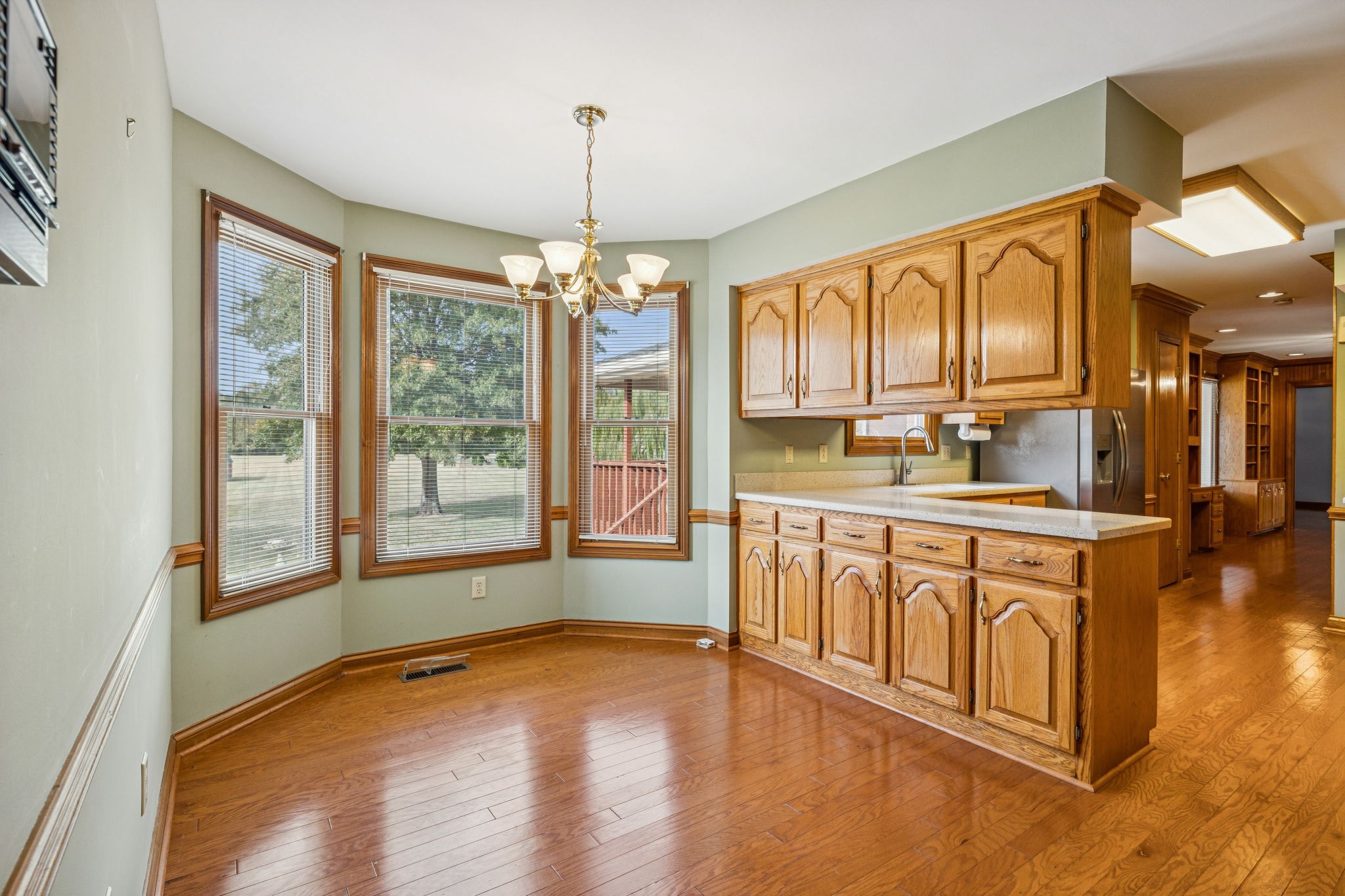 7935 Old Springfield Pike Goodlettsville, TN 37072 - Photo 28 of 82 a kitchen with stainless steel appliances granite countertop a stove a sink and a refrigerator