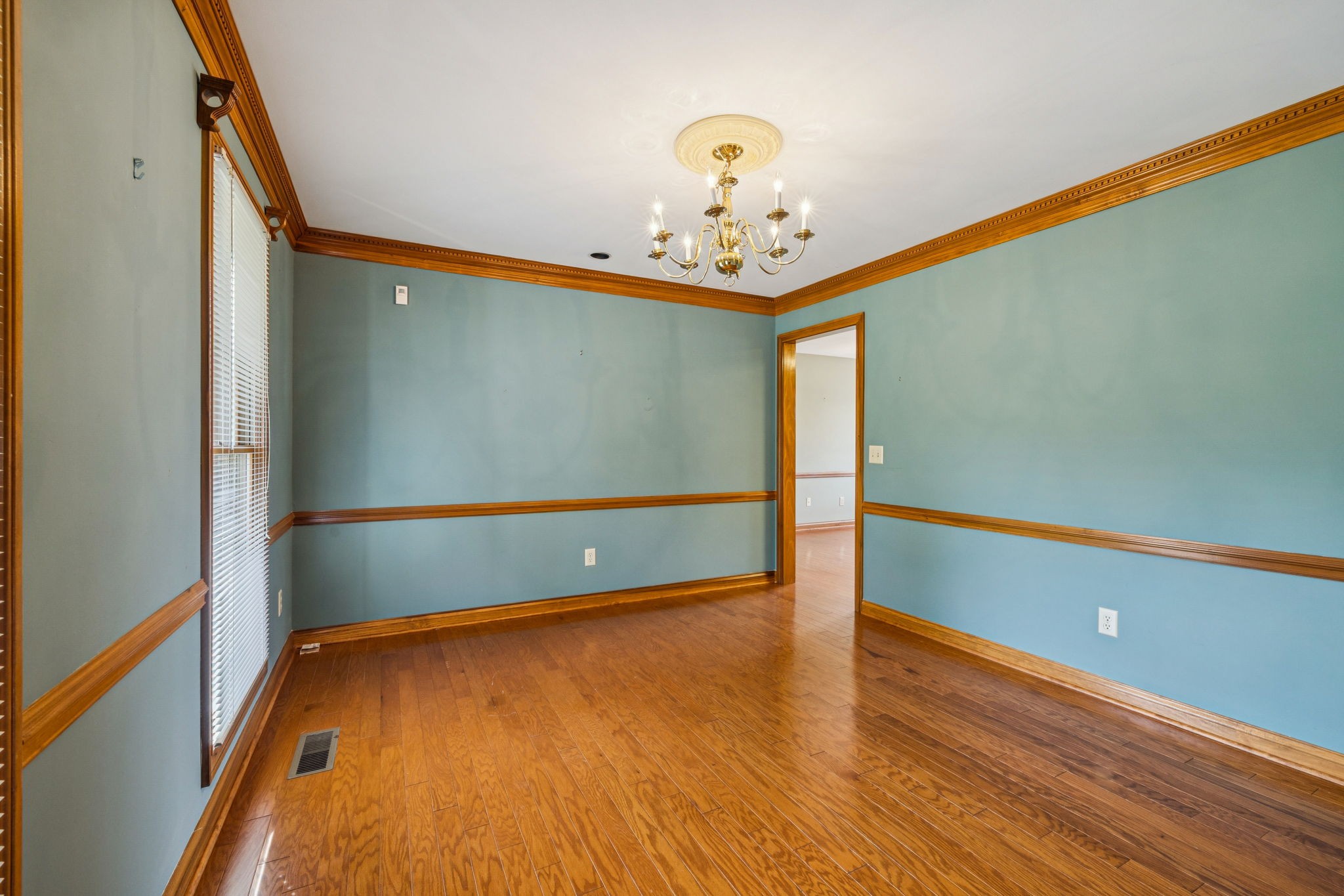 7935 Old Springfield Pike Goodlettsville, TN 37072 - Photo 30 of 82 a view of an empty room with wooden floor
