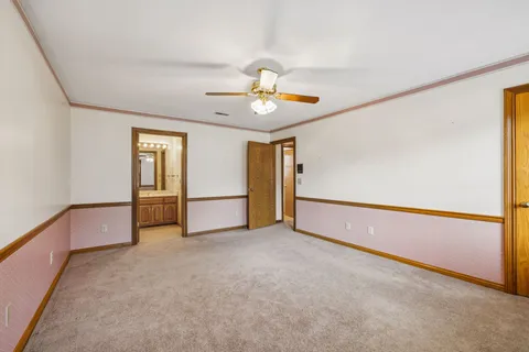 a bathroom with a tub and a sink