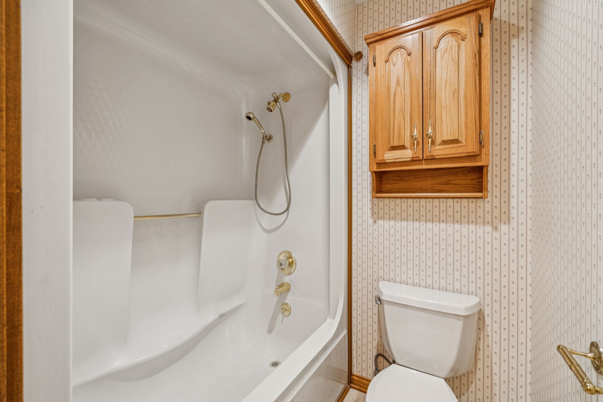 7935 Old Springfield Pike Goodlettsville, TN 37072 - Photo 39 of 82 a bathroom with a toilet and shower